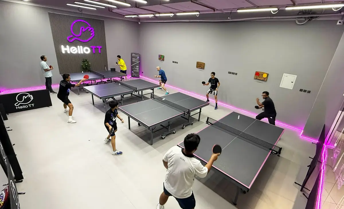 Adult players practising rally drills at HelloTT