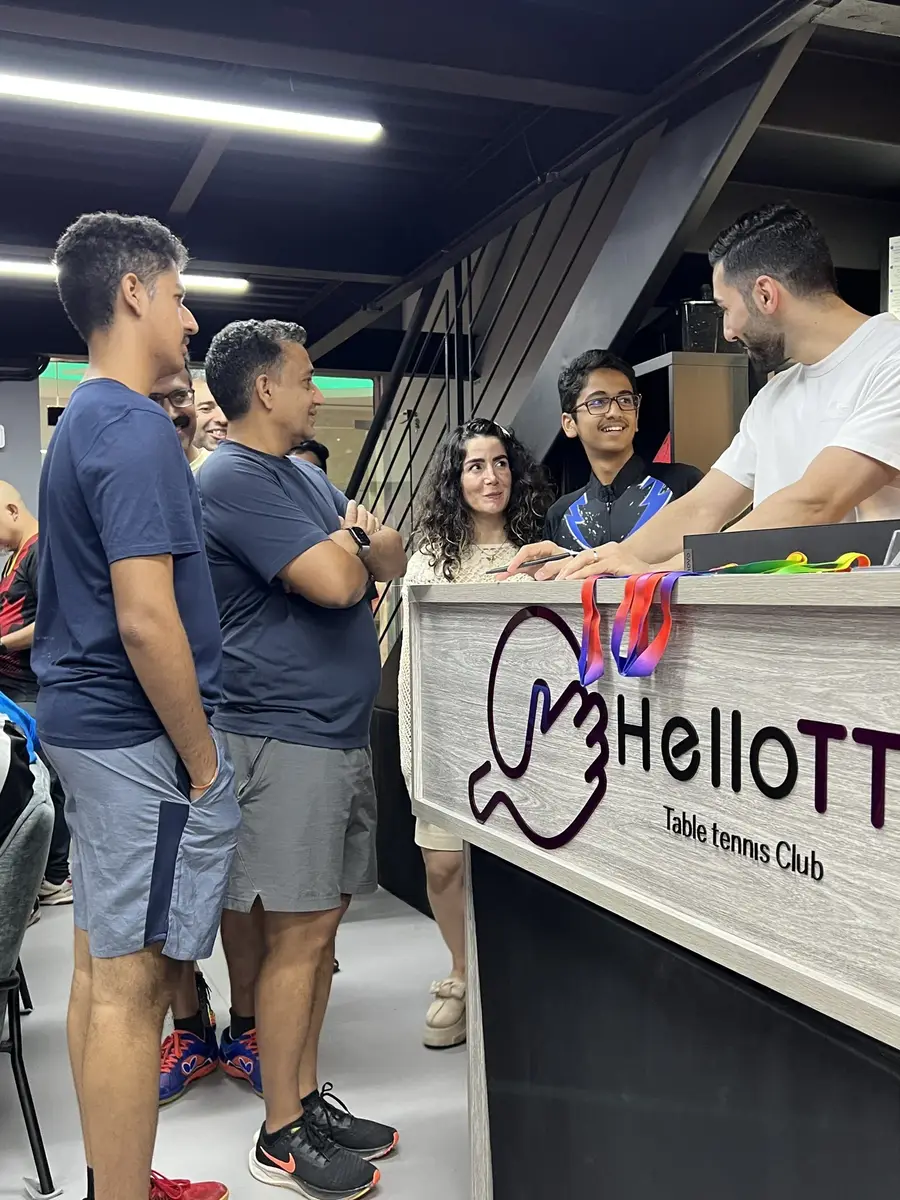 Players and a coach at a HelloTT event