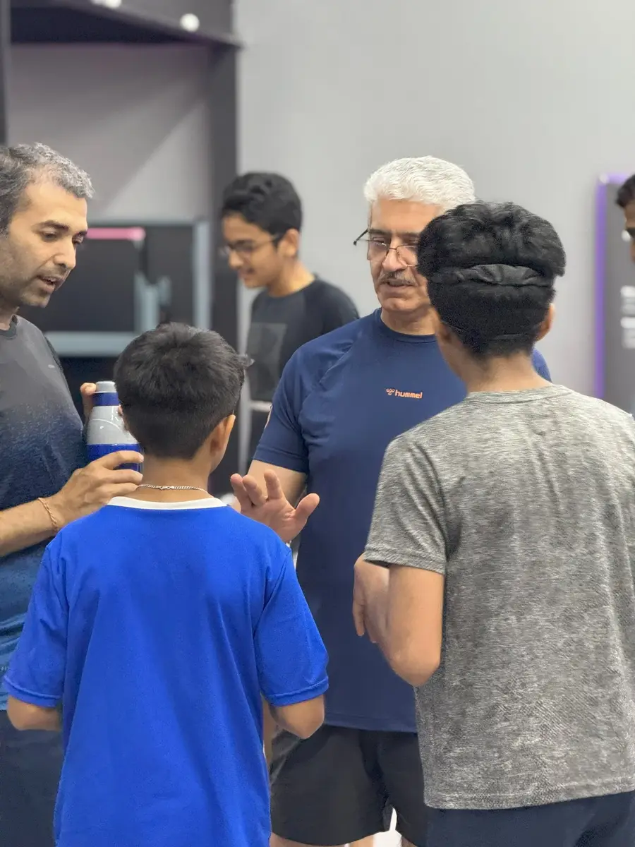 A father and son at a HelloTT event