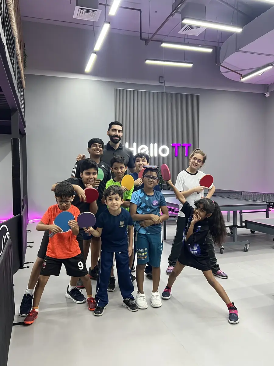 Smiling kids after a training session at HelloTT