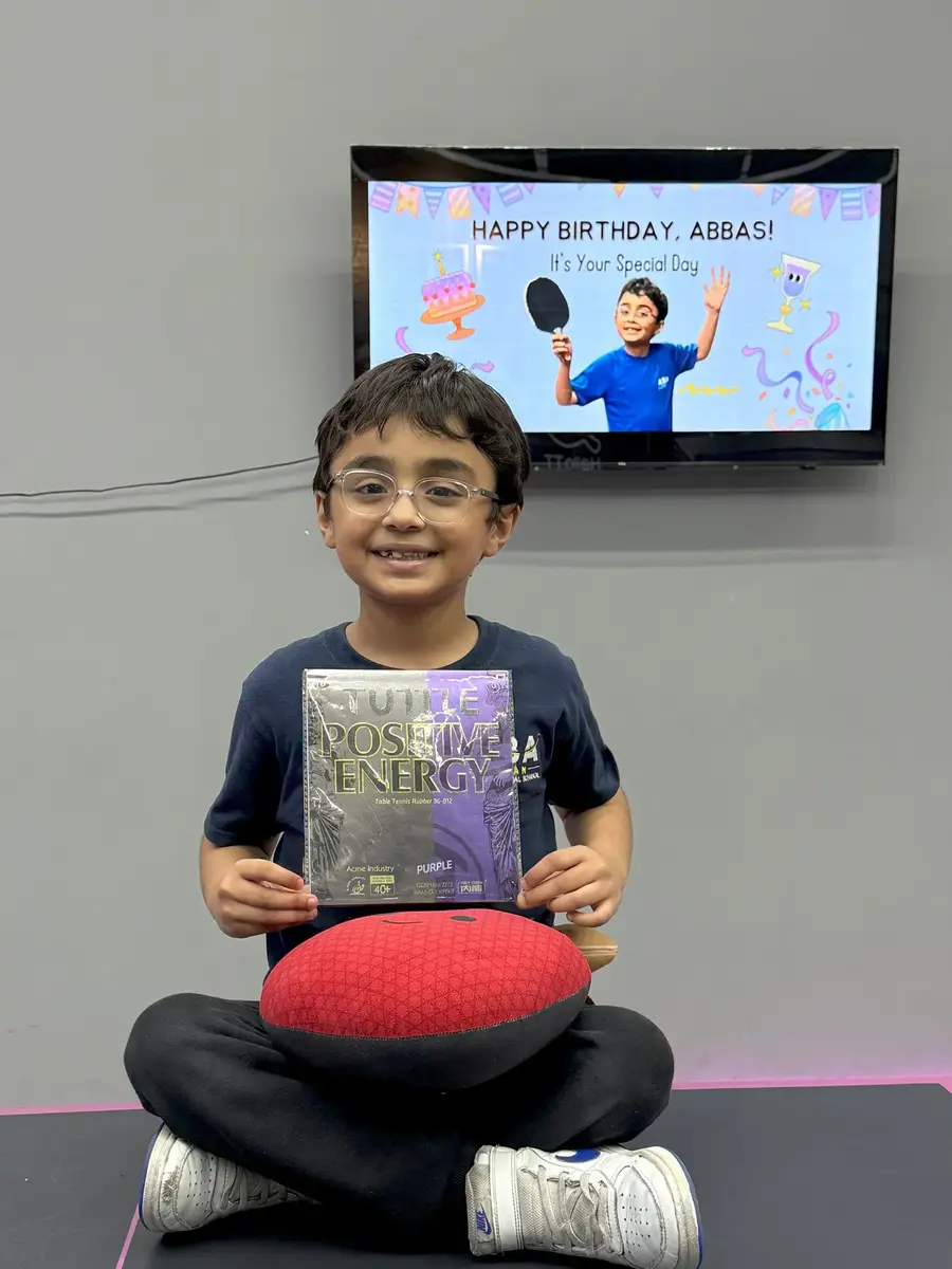 A young player celebrating a birthday at the club