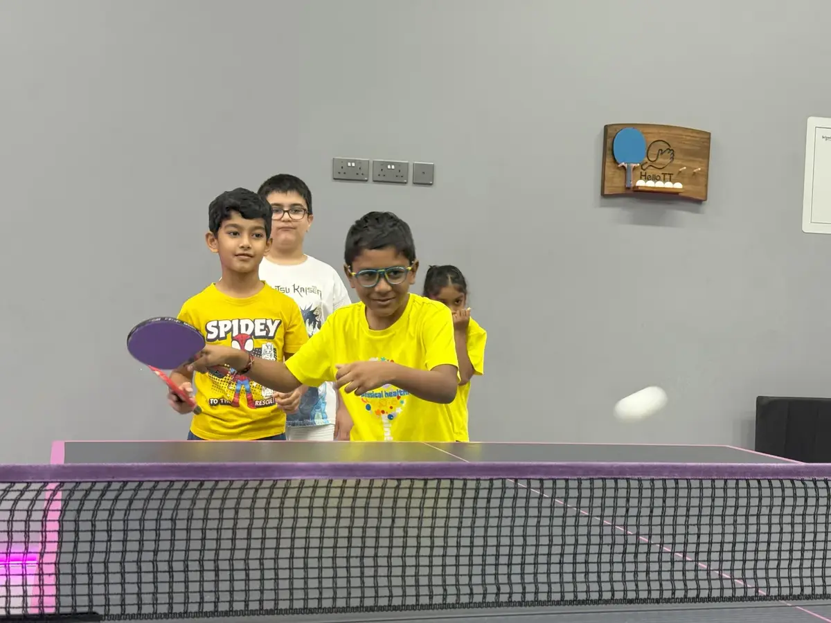 Kids training table tennis at HelloTT Muscat