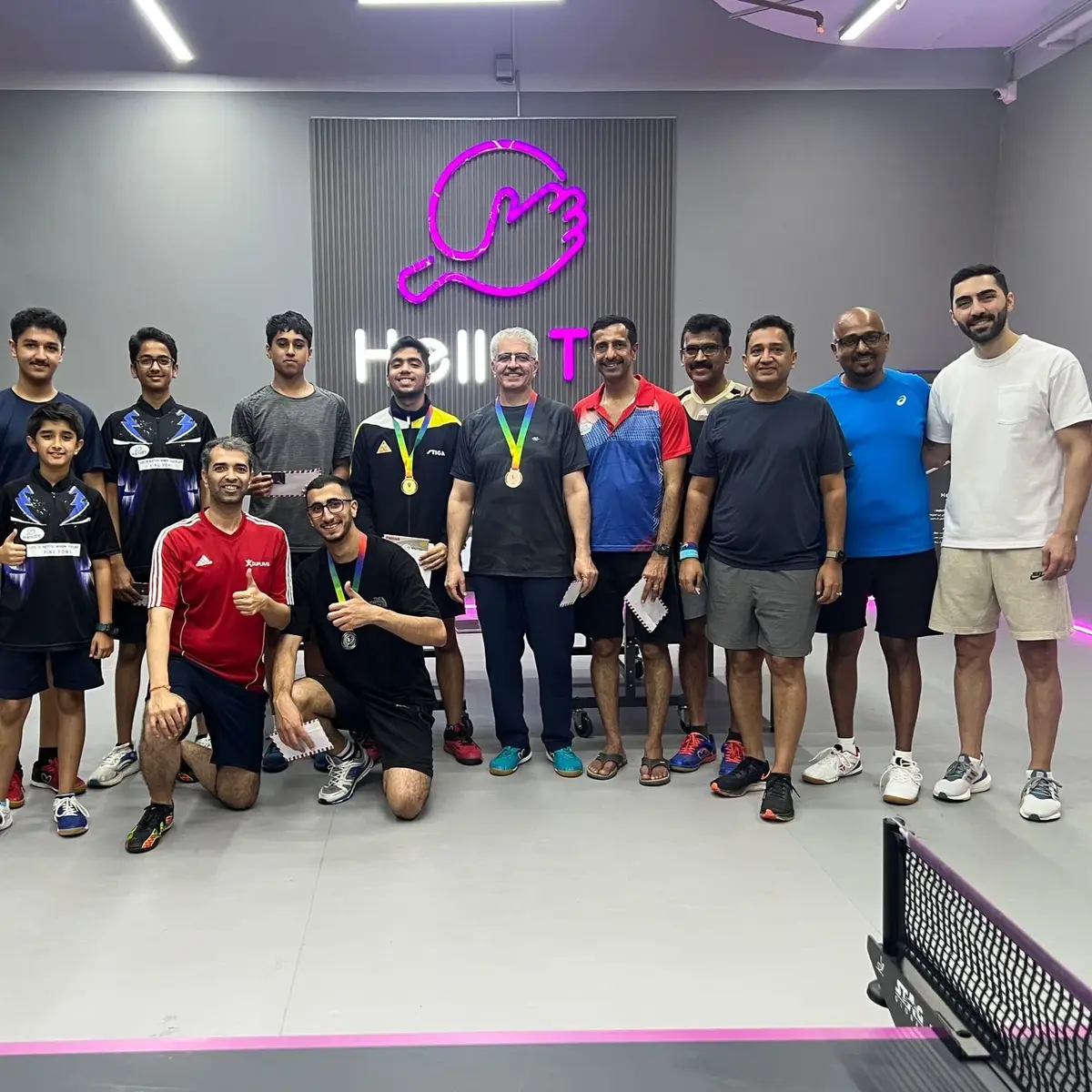Players of a HelloTT tournament together after the matches